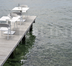 Итальянские Уличные столы - Стол обеденный PLINTO LOW TABLE BASE Итальянские Уличные столы - Стол обеденный PLINTO LOW TABLE BASE фабрика Varaschin